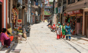 Women walking on street in Nepal