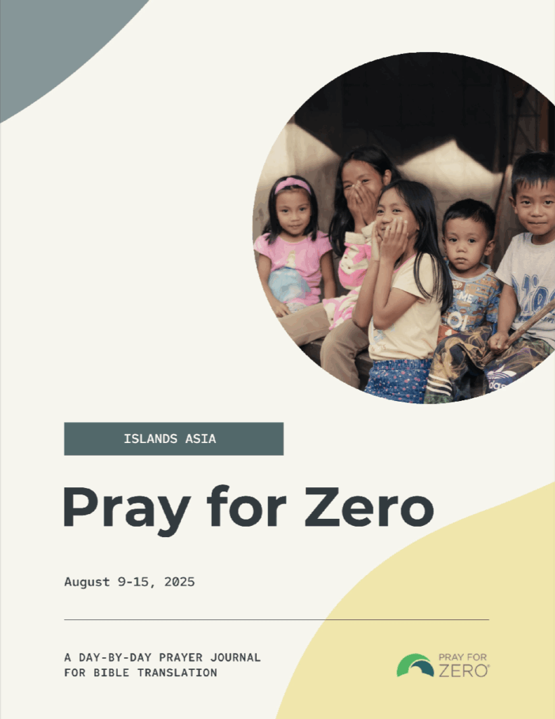 Children in Islands Asia smiling and sitting together, representing communities reached through Bible translation efforts — Pray for Zero August 2025 journal cover.