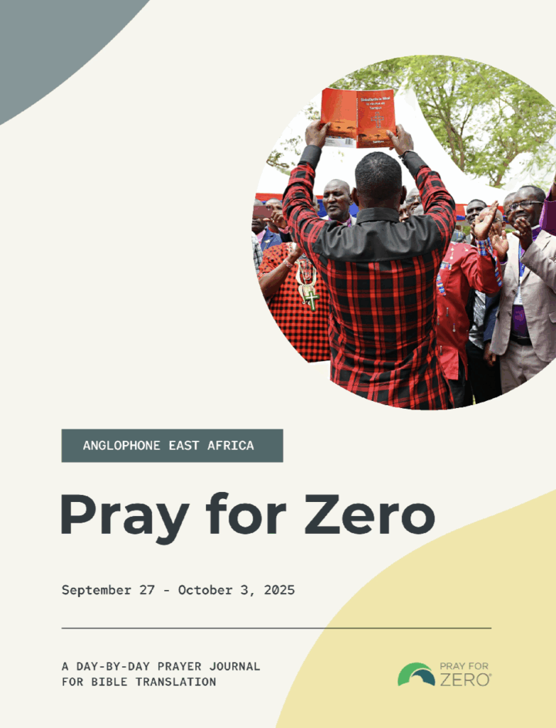 Group celebrating Bible translation with prayer journal – Pray for Zero Anglophone East Africa 2025